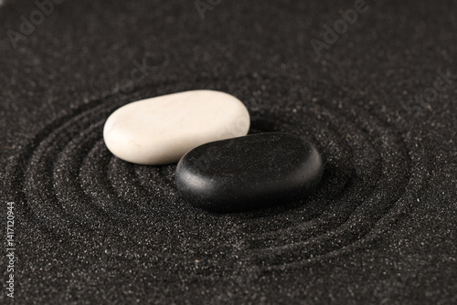 Obraz na płótnie Stones on black sand with lines. Yin Yang concept w salonie