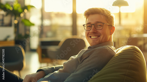 Side-angle view of a smiling accountant in a cozy pose