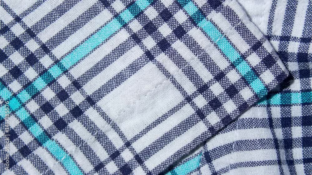 Classic blue and cyan plaid fabric texture as background, stop motion animated backdrop video