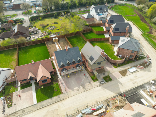 Aerial top down view of part of a British housing development site.  Showing both expensive detached and affordable semi houses.