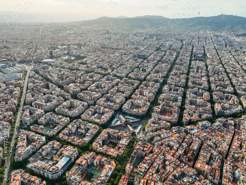 Photography Elevated view of Barcelona's Eixample layout stretching to the hills