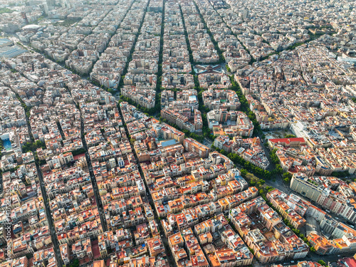 Photography High view of Barcelona's Eixample blocks under the morning sun
