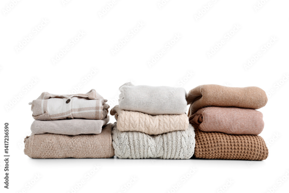 Obraz premium Stacks of clean clothes isolated on white background