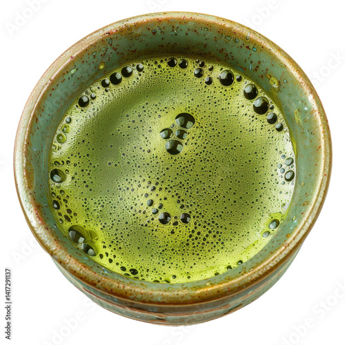 Obraz na płótnie vibrant green liquid with bubbles is displayed in rustic ceramic bowl, showcasing its rich color and texture. unique bowl adds artistic touch to presentation w salonie