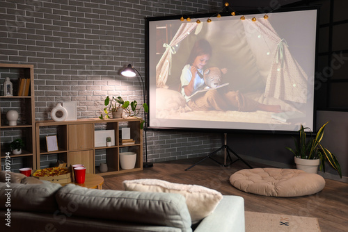 Cuadro en lienzo Interior of dark room with video projector screen. Home cinema