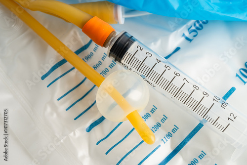 Foley catheter and urine drainage bag collect urine for disability or patient in hospital.
