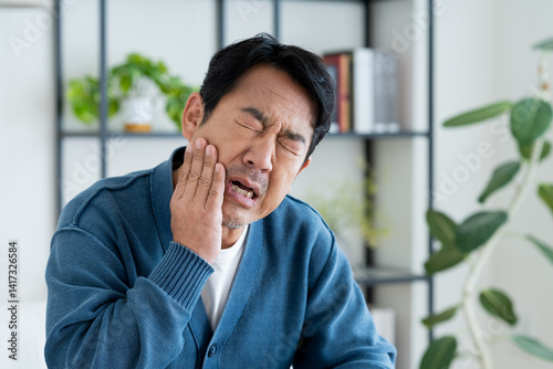 Tableau sur toile 歯が痛いミドルの男性
