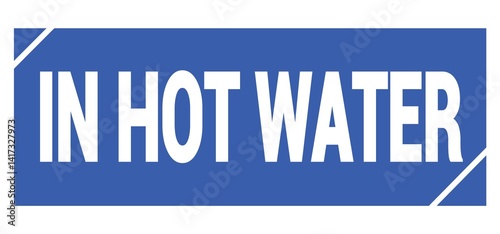 Obraz na płótnie IN HOT WATER text written on blue stamp sign. w salonie
