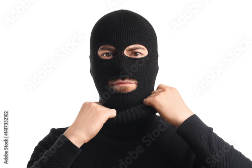 Young man wearing balaclava...