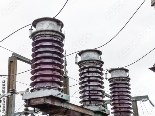 Power plant equipment for industrial energy distribution. High voltage substation insulator. Electricity infrastructure, transmission facilities, high power electrical supply