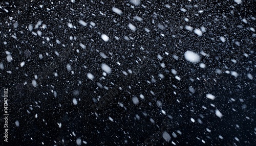 Falling snow on black background Winter background in pure dark Heavy snow