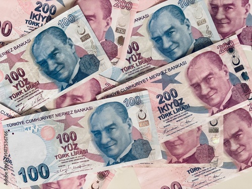 Fototapeta Naklejka Na Ścianę i Meble -  Turkish Banknotes featuring currency values of 100 and 200 Lira