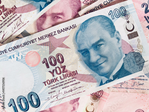Fototapeta Naklejka Na Ścianę i Meble -  Turkish Banknotes featuring currency values of 100 and 200 Lira