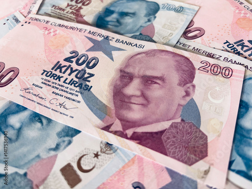Fototapeta Naklejka Na Ścianę i Meble -  Turkish Banknotes featuring currency values of 100 and 200 Lira