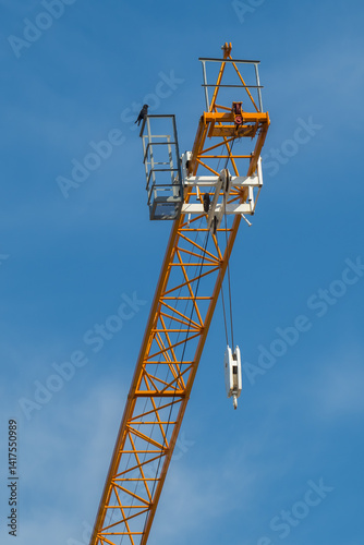 Wallpaper Mural Crane beam with bird on blue sky background Torontodigital.ca