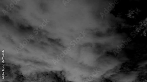 A mesmerizing time-lapse video capturing clouds drifting across the sky, creating a cinematic and surreal atmosphere.