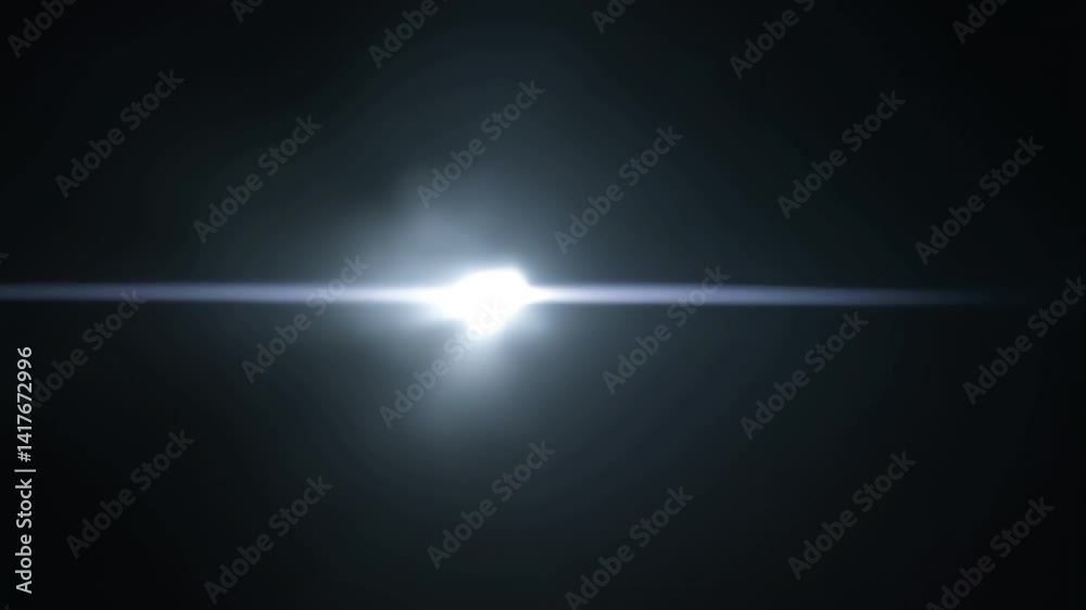 the appearance of a dazzling white light moving and emitting a smoke effect, with a black background