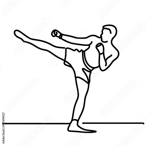 Man performing a kick during martial arts against a blank background  