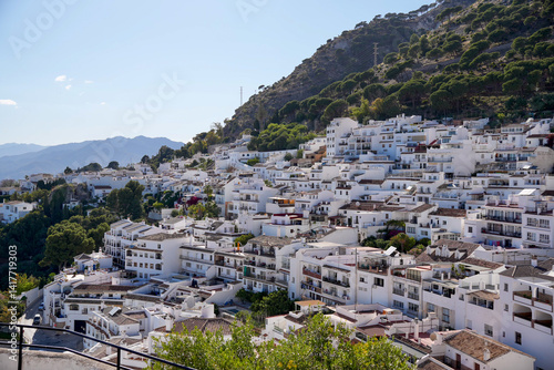 Fotografía White buildings of picturesque Mijas village on a hillside in Costa del Sol, And