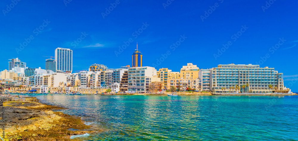 Cityscape of St Julian's Bay and skyscrapers in Paceville distric, Malta