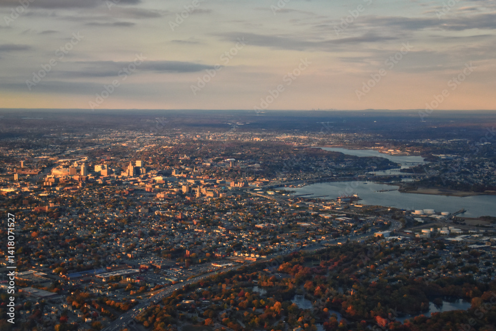 Providence, Rhode Island, fall at sunset from Airplane, Aerial, Downtown USA city skyline on the Providence River.