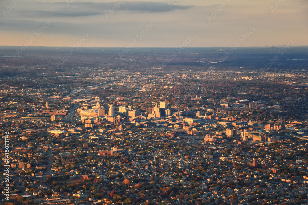 Providence, Rhode Island, fall at sunset from Airplane, Aerial, Downtown USA city skyline on the Providence River.