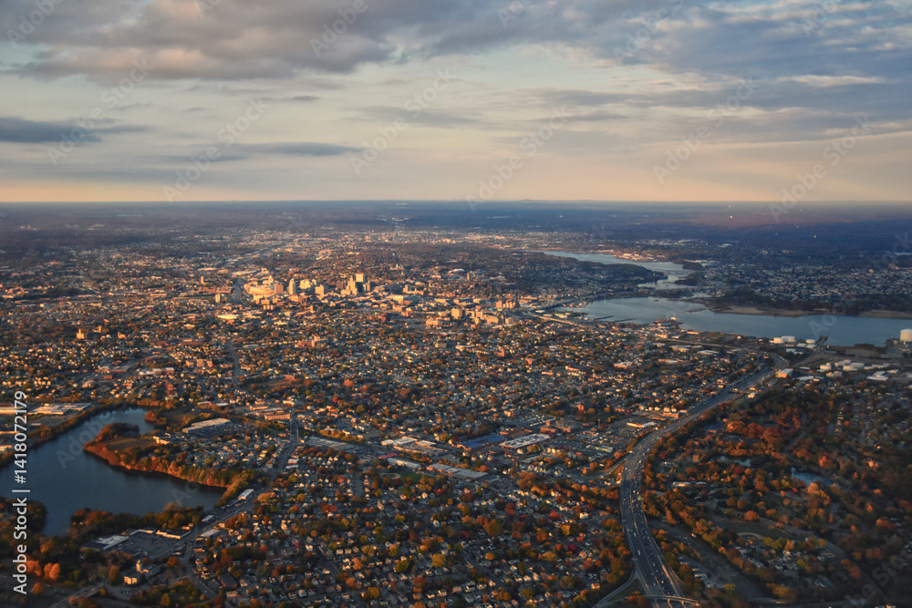Providence, Rhode Island, fall at sunset from Airplane, Aerial, Downtown USA city skyline on the Providence River.