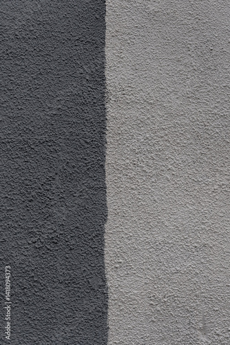 A wall with a gray and black stripe. The gray stripe is on the right side of the wall.