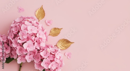 Obraz na płótnie Pink Hydrangeas and Gold Leaves - Delicate pink hydrangeas and elegant gold leaves arranged on a soft pink background. Perfect for wedding invitations, blogs, or feminine branding w salonie