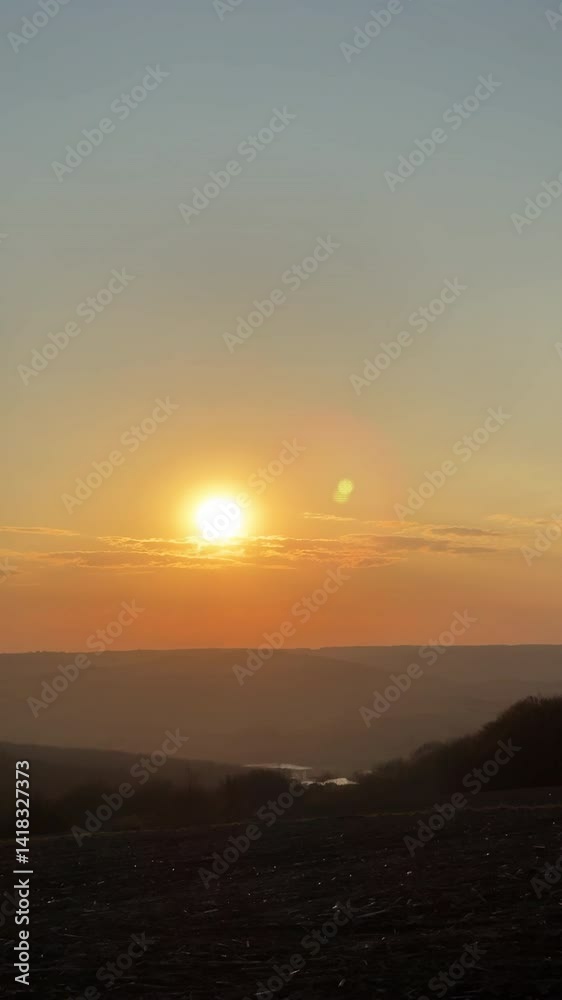 A Beautiful Sunset Over a Serene and Peaceful Landscape That Captivates the Senses