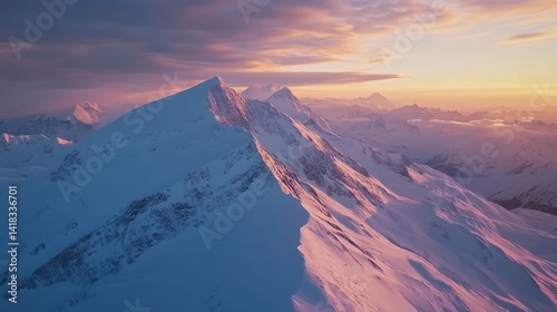 Snow Capped Mountain Range at Sunset with Colorful Cloudscape