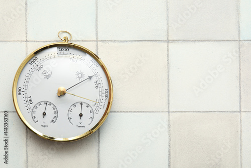 Bild auf Leinwand Aneroid barometer on white tiled background