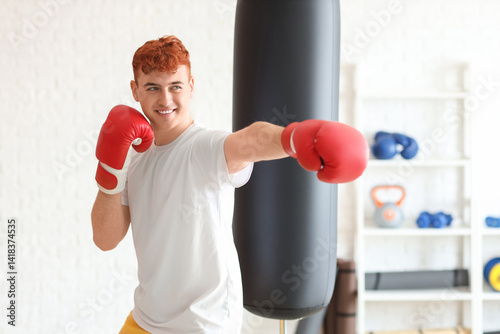 Young man with red hair and...
