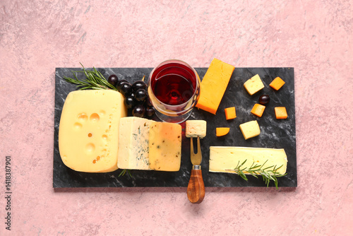 Board with tasty cheese, gr...
