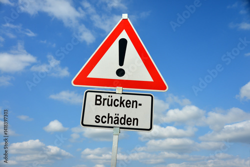 Hamburg, Germany - April 18, 2025: Traffic warning sign saying in German Brückenschäden - Bridge damage
