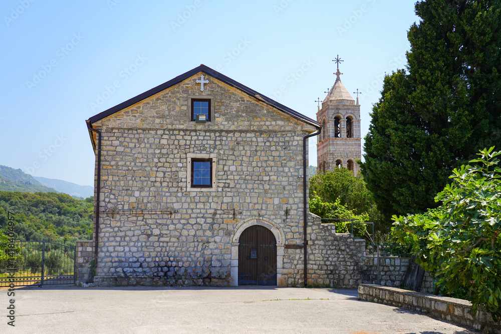Facade of the Reževići Monastery in Montenegro - Serbian orthodox monastery near Budva and the Adriatic Sea