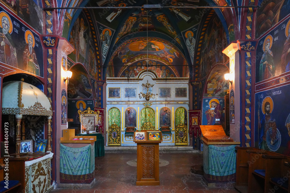 Interior of the Reževići Monastery in Montenegro - Church of the Dormition of the Mother of God of the Serbian orthodox church with vaulted ceilings and painted walls