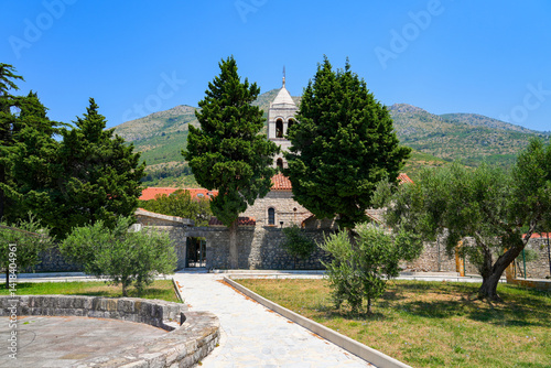 Obraz na płótnie Reževići Monastery in Montenegro - Church of the Dormition of the Mother of God of the Serbian orthodox church near Budva and the Adriatic Sea w salonie