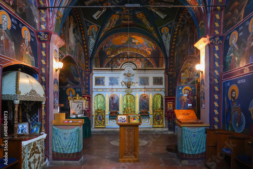 Obraz na płótnie Interior of the Reževići Monastery in Montenegro - Church of the Dormition of the Mother of God of the Serbian orthodox church with vaulted ceilings and painted walls w salonie
