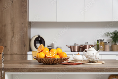 Wicker plate with oranges a...