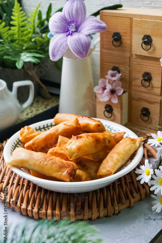 Fried spring rolls or Popiah Goreng, crispy fried spring roll filled with vegetables, meat or prawns, offering a crunchy delight.  Usually served for breakfast or afternoon tea.