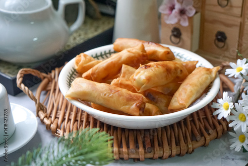 Fried spring rolls or Popiah Goreng, crispy fried spring roll filled with vegetables, meat or prawns, offering a crunchy delight.  Usually served for breakfast or afternoon tea.