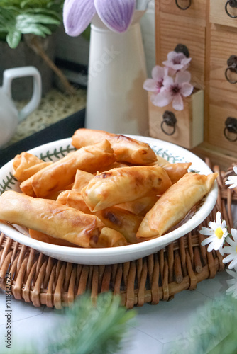Fried spring rolls or Popiah Goreng, crispy fried spring roll filled with vegetables, meat or prawns, offering a crunchy delight.  Usually served for breakfast or afternoon tea.