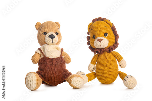 Cute knitted toys on white ...