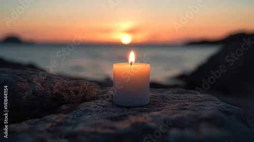 Peaceful candlelight at sunset on rocks by the sea