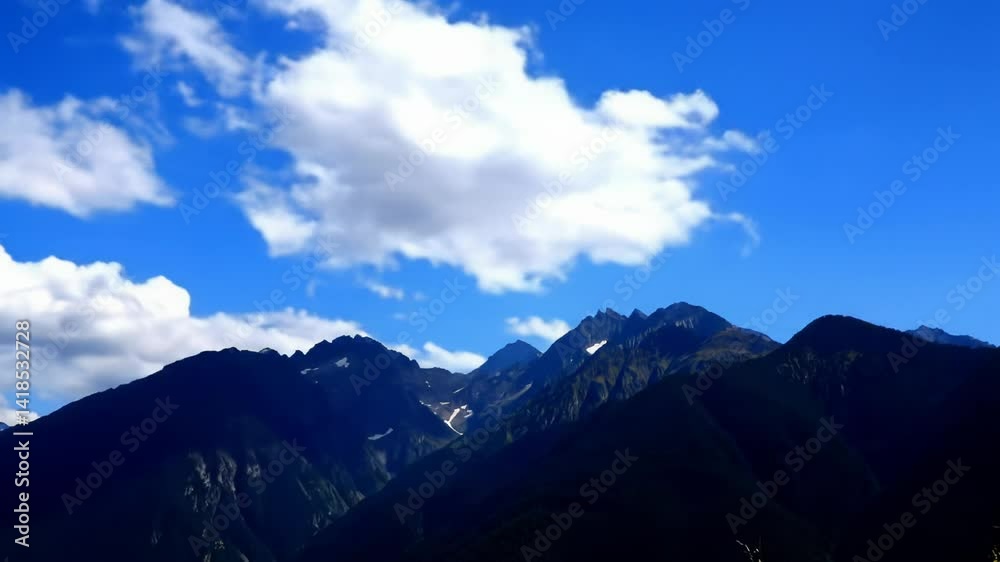 time lapse video of mountain view with blue sky time lapse video of mountain view with blue sky