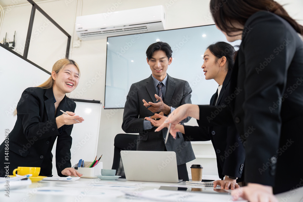 Team Collaboration and Business Discussion. A dynamic team engages in a lively conversation, sharing ideas in a modern office environment. Team Collaboration and Business Discussion. A dynamic team engages in a lively conversation, sharing ideas in a modern office environment.