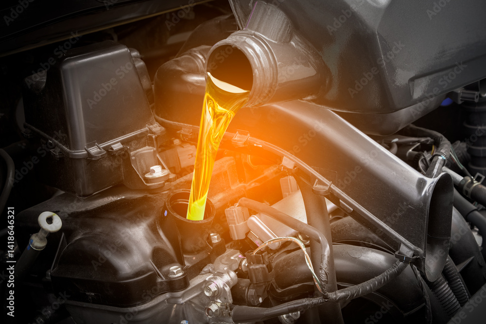 Refueling and pouring oil quality into the engine motor car Transmission and Maintenance Gear .Energy fuel concept.
