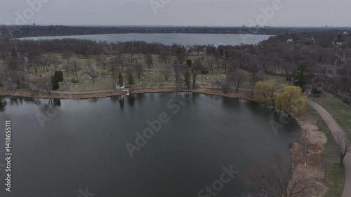 Minnesota Minneapolis Lake of the Isles Lake Bde Maka Ska Downtown Partly Cloudy Sunny Day Spring Fall Winter Drone Aerial 4K
