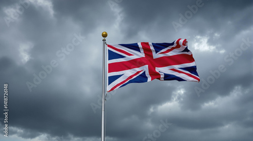 british flag waving in the wind of the storm sky